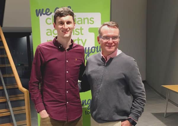 Manager of Belfast North & Newtownabbey CAP debt centre Daniel Black with charity founder, John Kirkby.