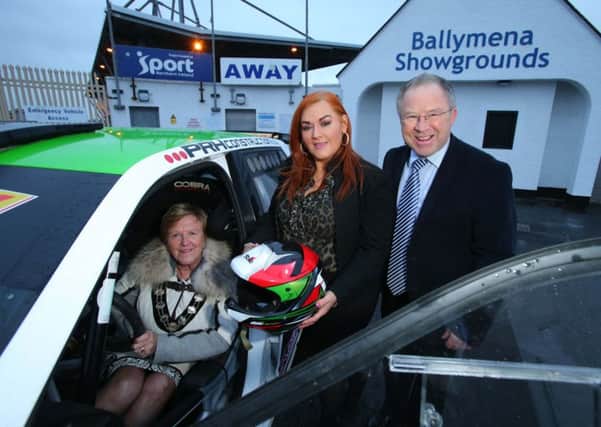 Mid and East Antrim Mayor, Councillor Audrey Wales MBE in the driving seat of the new Circuit Festival 2017 along with Council Chief Executive Anne Donaghy and Event Director Bobby Willis.