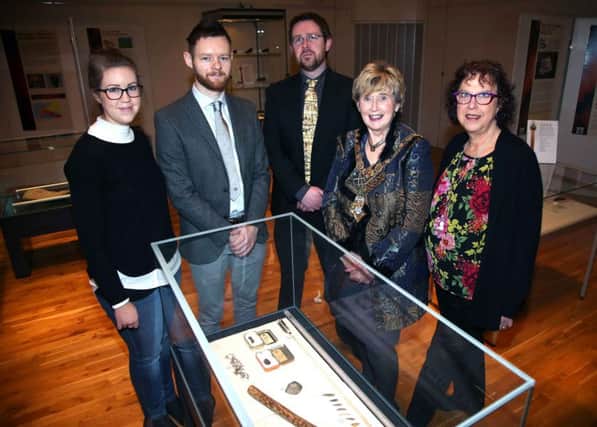 Sarah Carson, Museums Collections Officer, 	
Museums Officer David Robinson, 	
Dr Nic Wright from 
Hearthside Heritage, the Mayor of Causeway Coast and Glens Borough Council, Alderman Maura 
Hickey and Museums Services Development Manager Helen Perry pictured at the opening of the 
Flints and Fishes exhibition in Ballymoney Museum.