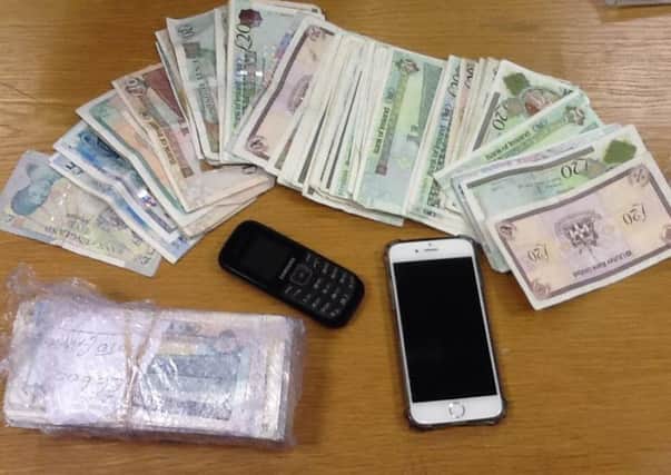 Police picture of Â£7000 in cash seized in Portrush during a drugs operation. INLT-05-706-con