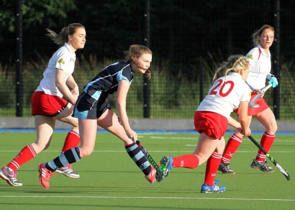 Coleraine's trio Grace Bradley, Sue Nutt and Naimh Lockhart go on the attack against Dromore Ladies. Photo by David McDonald.
