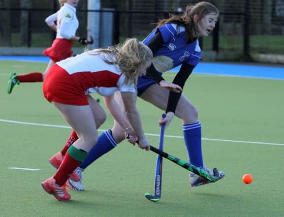 Helen McCallum is first to the ball against Portadown.  Photo by David McDonald.