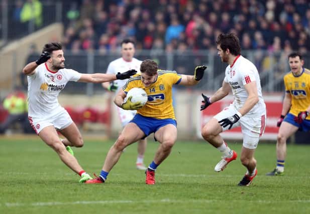 Roscommon's 
Ultan Harney is stopped in his tracks by Tyrone duo Tiernan McCann and Ronan McNamee during the National League opener in Healy Park. (Picture by Andrew Paton/Press Eye)