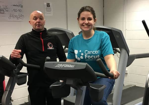 Fitness Factory owner Alan Campbell chats with Cancer Focus NI Community Fundraiser Lianne Wilson at the launch of Focus Fit Lurgan.