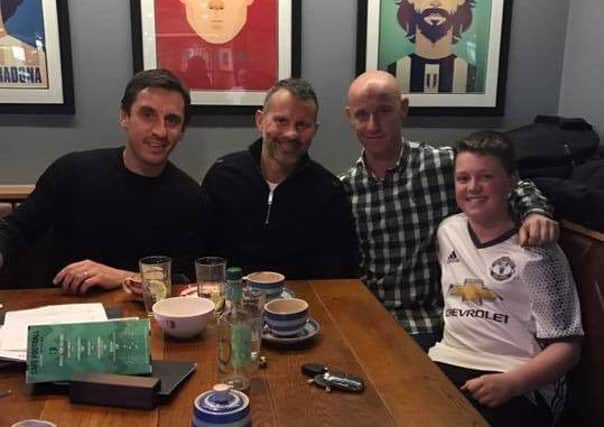 L-R: Manchester United legends Gary Neville, Ryan Giggs and Nicky Butt with Larne boy Dean Norrell. INLT-05-714-con