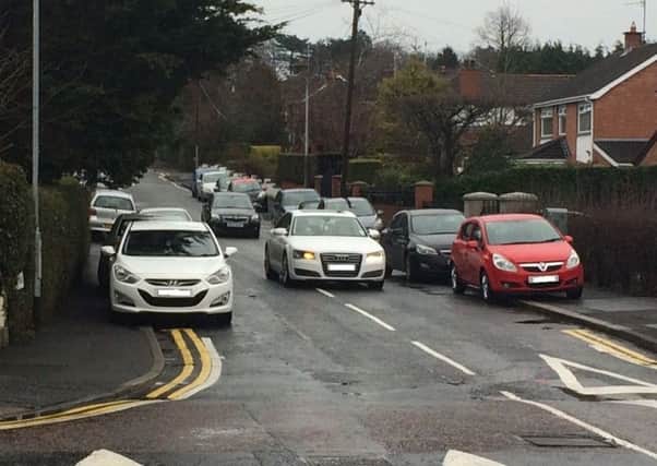 Residents of Clonevin Park have called on TransportNI and the PSNI to take action to resolve ongoing parking problems in their street.