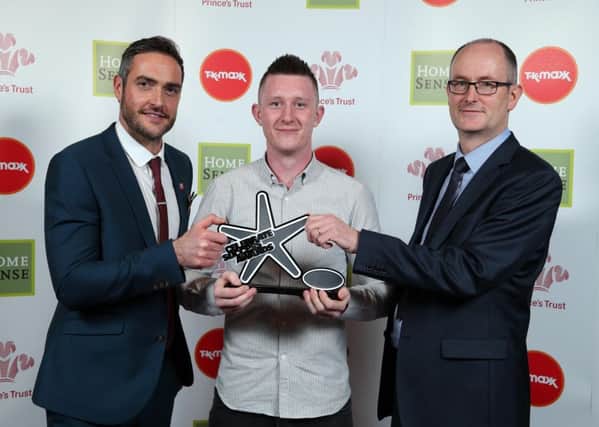 Ryan Lennon celebrates winning the Rising Star Award with actor Patrick Buchanan and Donal McAteer of Devenish Nutrition  at The Prince's Trust and TK Maxx & HomesenseCelebrate Success Awards. Now in their 13th year, the Awards recognise disadvantaged young people who have overcome issues such as abuse, drug addiction, homelessness, depression and unemployment. Photo by Kelvin Boyes / Press Eye.