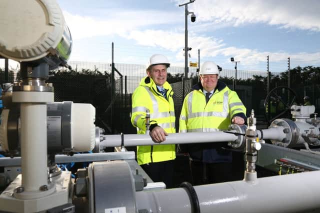 Marking the pipeline completion are Paddy Larkin (left), chief executive, Mutual Energy and Danny OMalley, director of Natural Gas, SGN. INLS 07-794-CON