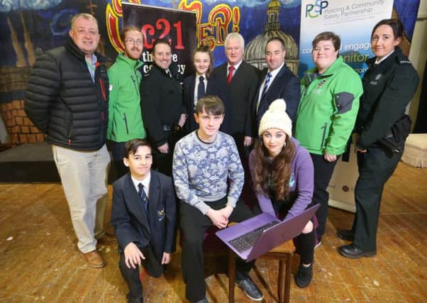 Learning how to stay safe online: Colin Reid, NSPCC; Alderman Michael Henderson MBE, Chairman of Lisburn & Castlereagh PCSP; Mr Dane, Laurel Hill College; Jenny Magee, Lisburn YMCA; PSNI officers; actors from C21 drama group and pupils from Laurel Hill College.
