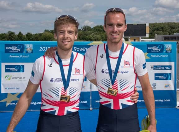 Joel Cassells pictured with Olympic silver medalist Peter Chambers after they won a gold medal win in Poznan. [Mandatory Credit: Peter Spurrier/Intersport-images]