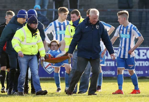 Ian Parkhill is stretchered off during Saturday's Danske Bank Premiership game against Dungannon at the Showgrounds, Coleraine. Photo by William Cherry/Presseye