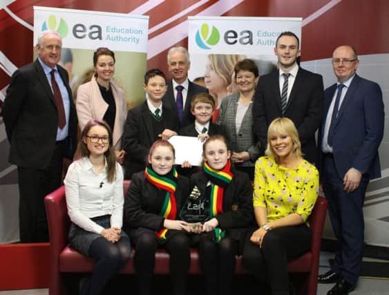 EA's Online Safer Internet Video CompetitionÃ¢Â¬" first prize winners Holy Trinity College, Cookstown, pictured at EA tv studio with Peter Bower UK Safer Internet Centre, Orla O'Hagan NSPCC, Gerard McStocker Teacher, Bernie McNally Chair SBNI, Conor Mallon School Technician and Damian Harvey C2k. Front row: Rosanna Jack Anti-Bullying Forum and TV Presenter Emma-Louise Johnston.