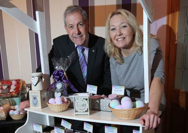 Councillor Uel Mackin, Chairman of the council's Development Committee, met with local businesswoman Wendy Houston to hear how 'Go for It' played a role in her starting her own business, Wonder Scents.