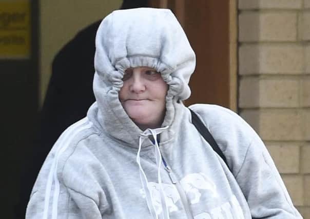 Joanne Mitchell leaves Antrim Crown Court after receiving two years probation