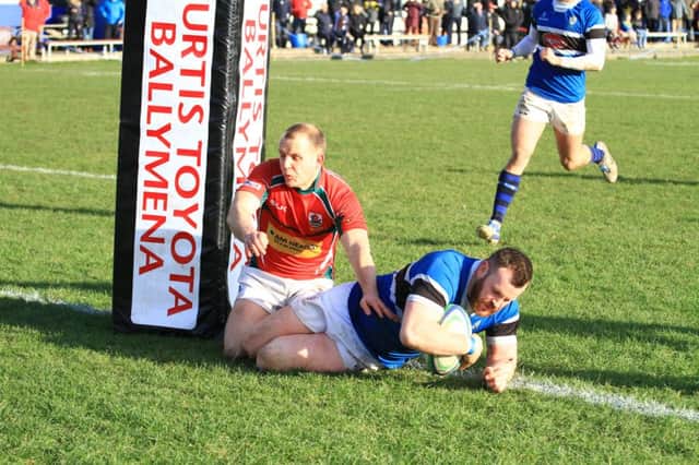Coleraine's Steven Dickey crosses the line for his side's second try. Photo David McDonald.