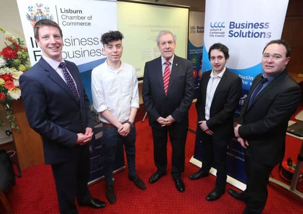 Councillor Uel Mackin (centre) with (l-r) Jonathan Steen, President of Lisburn Chamber of Commerce; Stuart McDonnell and Eoin Lavery, Apple Solutions Experts, Dixons Carphone Warehouse; and Stephen Houston, former President of Lisburn Chamber of Commerce.