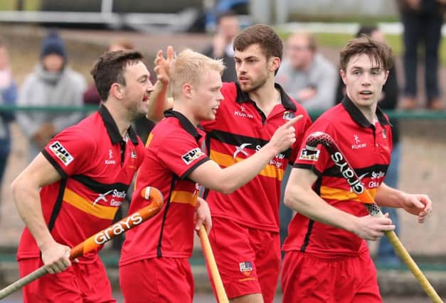 Matthew Bell (second right) accepts the plaudits after one of his two goals against Corinthians. Photograph by Declan Roughan