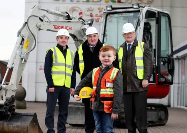 Site Foreman, Ross Patterson (7) calls the shots on site of the new isolation rooms being constructed at the Children's Cancer Unit at RBHSC. He is pictured with (L-R) Brian McGivern, Killowen Contracts, Peter McNaney, Chairman at Belfast HSC Trust and Felix Mooney, Chair of the Children's Cancer Unit Charity.