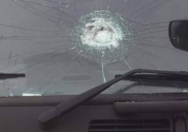Damage caused to a car windscreen in Larne. INLT-08-706-con