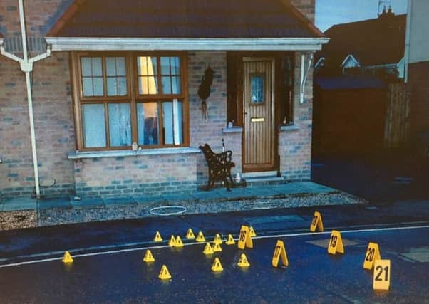 Police issue photo of where gun casings fell after automatic gunfire was sprayed at a house in Carrigart Cresent, Lurgan. One man, Ty Mcguire, was critically injured in the attack