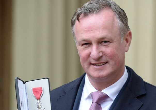 Northern Ireland football manager Michael O'Neill after he received his Member of the Order of British Empire (MBE) medal