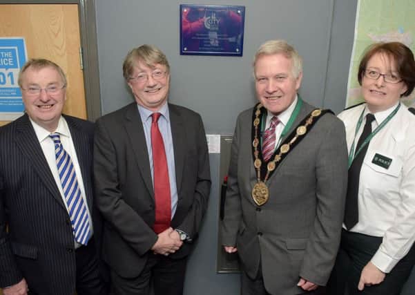 Station are from left:  Ernie Knox Chair of Lisburn Commerce Against Crime, Nick Perry Permanent Secretary of Dept. of Justice, His Worshipful His Right Worshipful the Mayor of Lisburn & Castlereagh City Council, Cllr Brian Bloomfield MBE and PSNI Chief Inspector Lorraine Dobson.