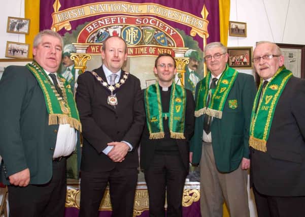 The Dungannon Branch of the Irish National Foresters celebrating their 125th year with a reception at Ranfurly Arts Centre on the Hill of the O'Neill in March 2014. 
From left, Gerard Devlin (High Chief Ranger of Ireland) Sean McGuigan (former mayor of Dungannon and South Tyrone Borough Council) Fr Ryan McAleer CC Dungannon ((Honorary member) Eddie McNally (Chief Ranger Dungannon) and Brian Boyle (Branch Secretary) INTT1014-600OC