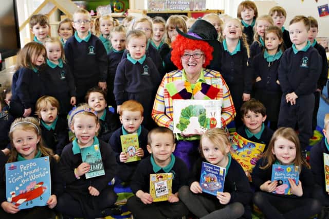 Coleraine ASDA Community Champion Sheila Palmer is The Mad Hatter during her visit to Mill Strand Integrated Primary School for World Book Day.   ASDA at Mill Strand_4587