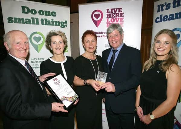 Members of Tidy Randalstown accept the Antrim and Newtownabbey Litter Heroes Award on behalf of Teresa Duffy, Tidy Randalstown, with Joe Mahon and Live Here Love Here Manager, Jodie- Ann McAneaney.