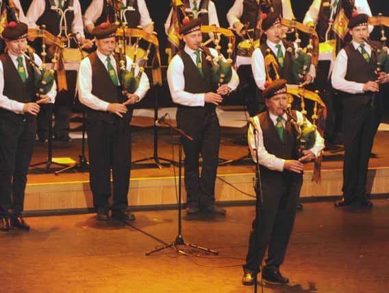 Pipe Major Bill Livingstone (78th Fraser Highlanders Pipe Band) pictured performing at the Live back in Ireland 87 concert at the Waterfront Hall, Belfast on Saturday 25th February.  Included is Richard Parkes, MBE, Pipe Major of Field Marshal Montgomery Pipe Band (left).
