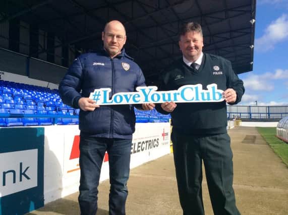 Coleraine FC general manager Stevie McCann with Sergeant Terry McKenna representing PSNI at the local launch of #LoveYourClub
