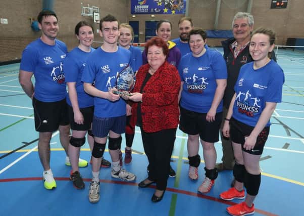 The 'Dodgeball Cup' was won by team Spartan Sports Coaching who are pictured with Barbara Porter, Health and Social Wellbeing Improvement Senior Officer from the Public Health Agencys Belfast and South Eastern Team, and Councillor Tim Morrow, Chairman of the council's Leisure and Community Development Committee.