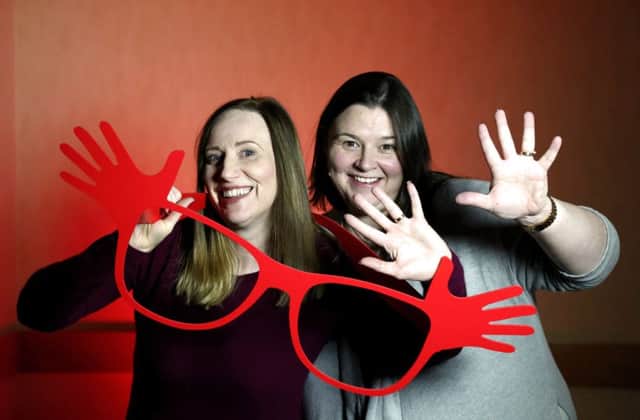 Coleraine Specsavers Store Directors, Lynn Mackey and Judith Ball giving a wave for Comic Relief.

February 2017 - Picture by Darren Kidd / Press Eye.