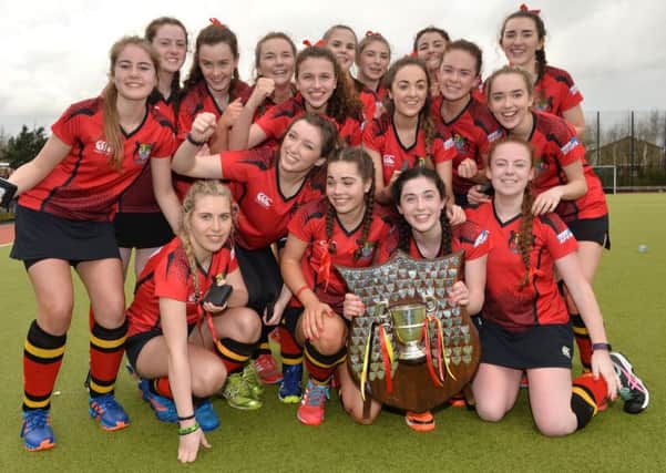 Banbridge Academy celebrate their Ulster Senior Schoolgirls' Cup success after a 4-0 win over Wallace High in the final