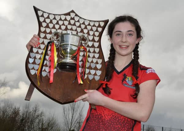 Orla Thompson becomes the first Banbridge Academy captain to get her hands on the Ulster Senior Schoolgirls' Cup. Pics: Presseye.