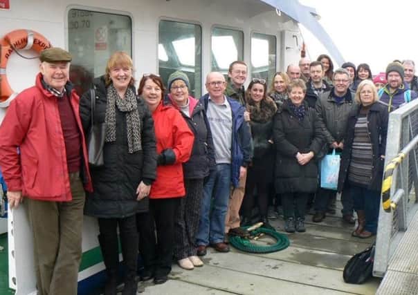 Mary ODriscoll, Rathlin Island Ferry Ltd and Chair of Antrim Glens Tourism (second left) with tourism business providers on the ferry to Rathlin.