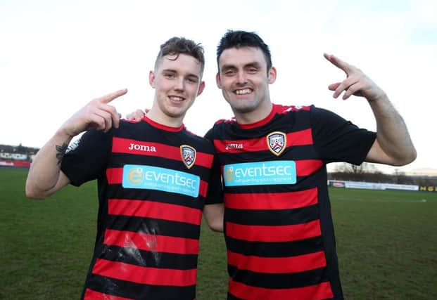 Coleraine double goal scorers  Jamie McGonigle (left) and Eoin Bradley celebrate after their 4-0 victory over  Ballymena United during Saturday's Tennents Irish Cup quarter final at Ballymena Showgrounds. Picture by Brian Little/Presseye