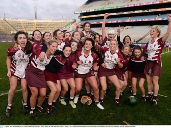 Slaughtneil players celebrate following their side's victory during the AIB All-Ireland Senior Camogie Club Championship Final.