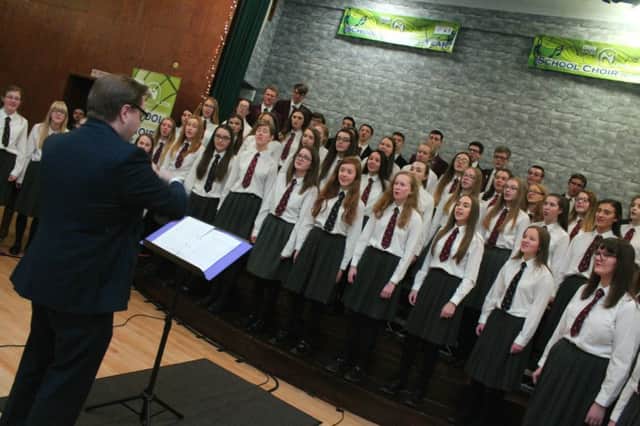 Carrickfergus Grammar choir who, along with Greenisland Primary School, are the first two schools to win places in the semi-finals of the BBC Radio Ulster School Choir Of The Year, which will take place at Dalriada School, Ballymoney on Monday 27 March.