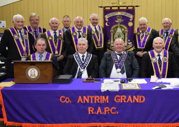 County Antrim Grand Royal Arch Purple Chapter held its half yearly meeting on Saturday. Grand Officers from the Grand Royal Arch Purple Chapter of Ireland. District Officers representing the 25 Districts within County Antrim attended.  They included: Seated (from left):  Most Worshipful Brother R. John Clarke, Most Worshipful Grand Master Grand Royal Arch Purple Chapter of Ireland and (standing from left): Right Worshipful Brother Kenneth Hull, Right Worshipful County Grand Master County Antrim Grand Royal Arch Purple Chapter.(Contributed)