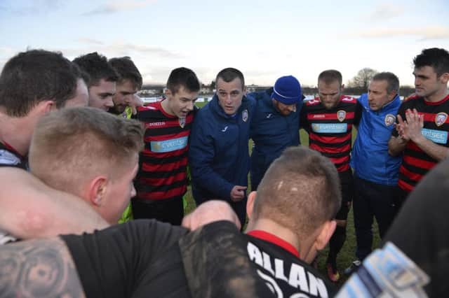 Oran Kearney congratulates his team after Saturday's game against Ballymena Unitedt.
Photo Mark Marlow/Pacemaker Press