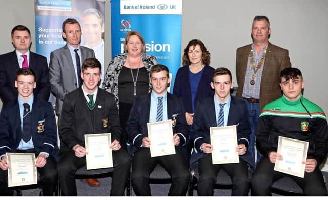 Young entrepreneurs from Cookstown High and Holy Trinity with teachers, principals and Rotary Club members