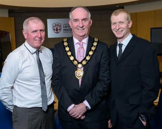 Retired Crew Commander Wilbert McKay, Councillor Trevor Wilson Chair of Mid Ulster Council and Retired Crew Commander Hugh Marshall.