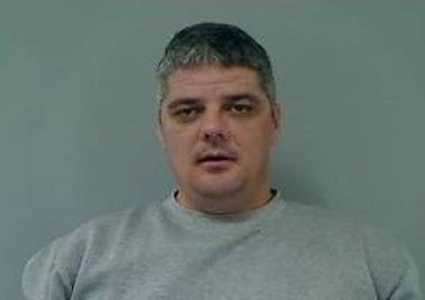 Michael Lawrence Smith (38). Photo issued by PSNI