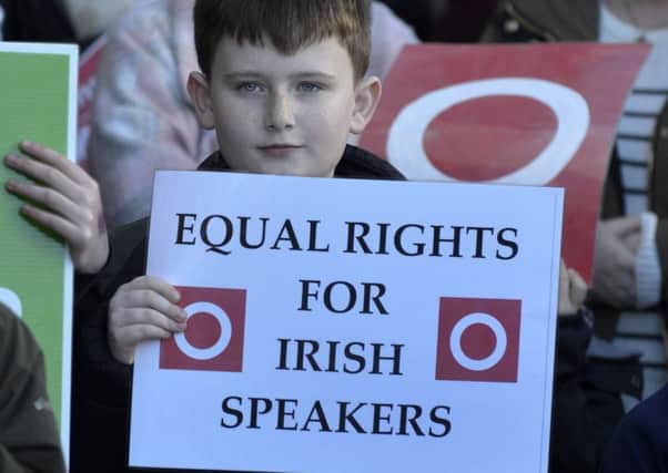 A young Irish speaker at an Irish language protest outside CultÃºrlann UÃ­ ChanÃ¡in, Great James Street, last month.