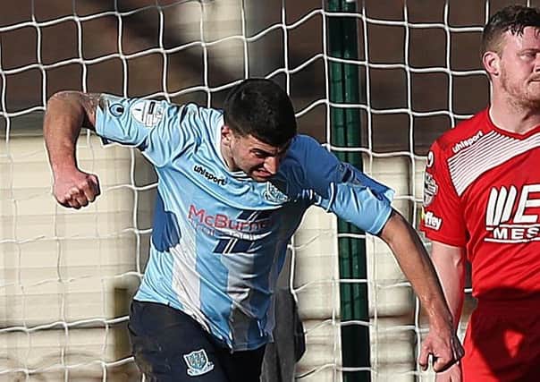 United defender Jonny Flynn celebrates scoring during the routine win over Portadown.

Picture by Brian Little/Presseye