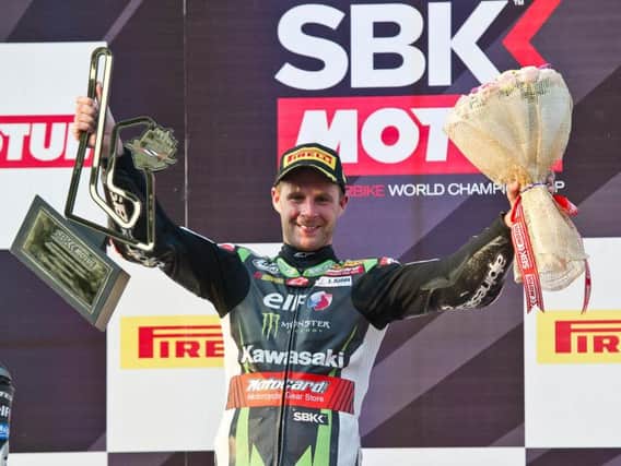 Jonathan Rea celebrates his World Superbike double in Thailand.
