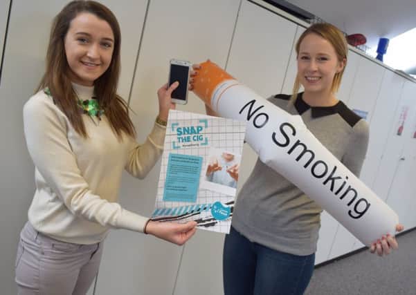 Mairead Stewart (left), from Cancer Focus Northern Ireland, gets Jillian Wallace, from Randalstown, to enter the charitys fun Snapchat competition and be in with a chance to win an iPad. The competition aims to encourage young people to stay smokefree. All you have to do is add Cancer Focus NI on Snapchat (cancerfocusni) and send them a snap before March 31. Youll also need to add your picture to your Snapchat story.
