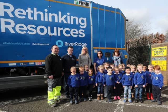 Pam Jordan (back centre) of River Ridge and River Ridge Operatives Trevor McLaughlin and Gerard Logue with pupils from Ballymena Nursery School and staff members Rhonda Scullion (Nursery Assistant) and Claire McGall (Nursery Assistant).