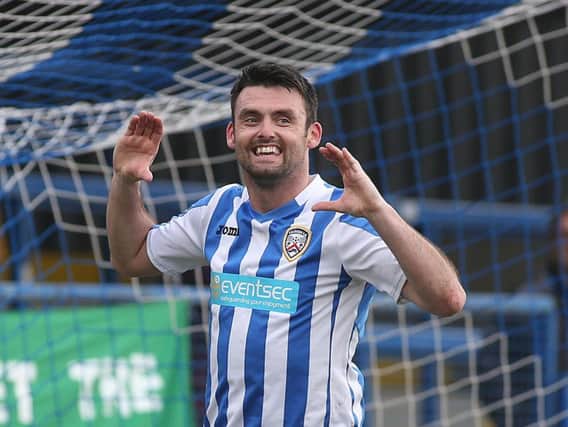 Coleraine's Eoin Bradley celebrates after he scored the opener in his side's win over Coleraine
